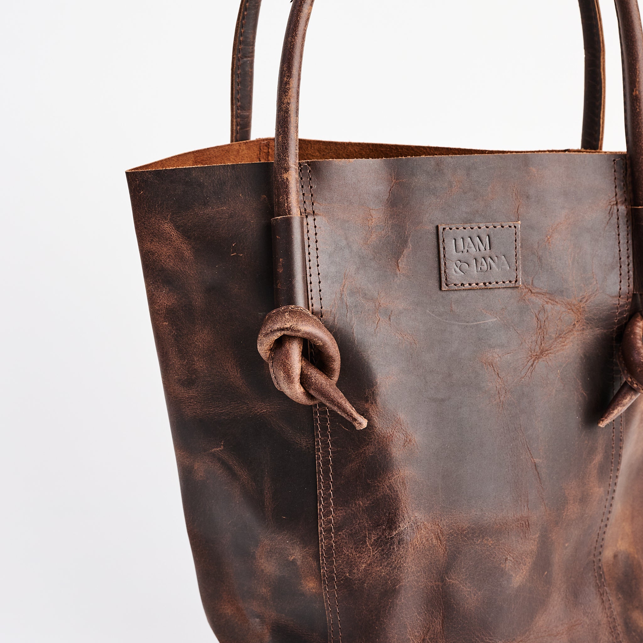 Elsie Leather Tote in Antique Brown on a white background at Addison West