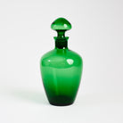 Vintage Green Glass Decanter on a white background at Addison West