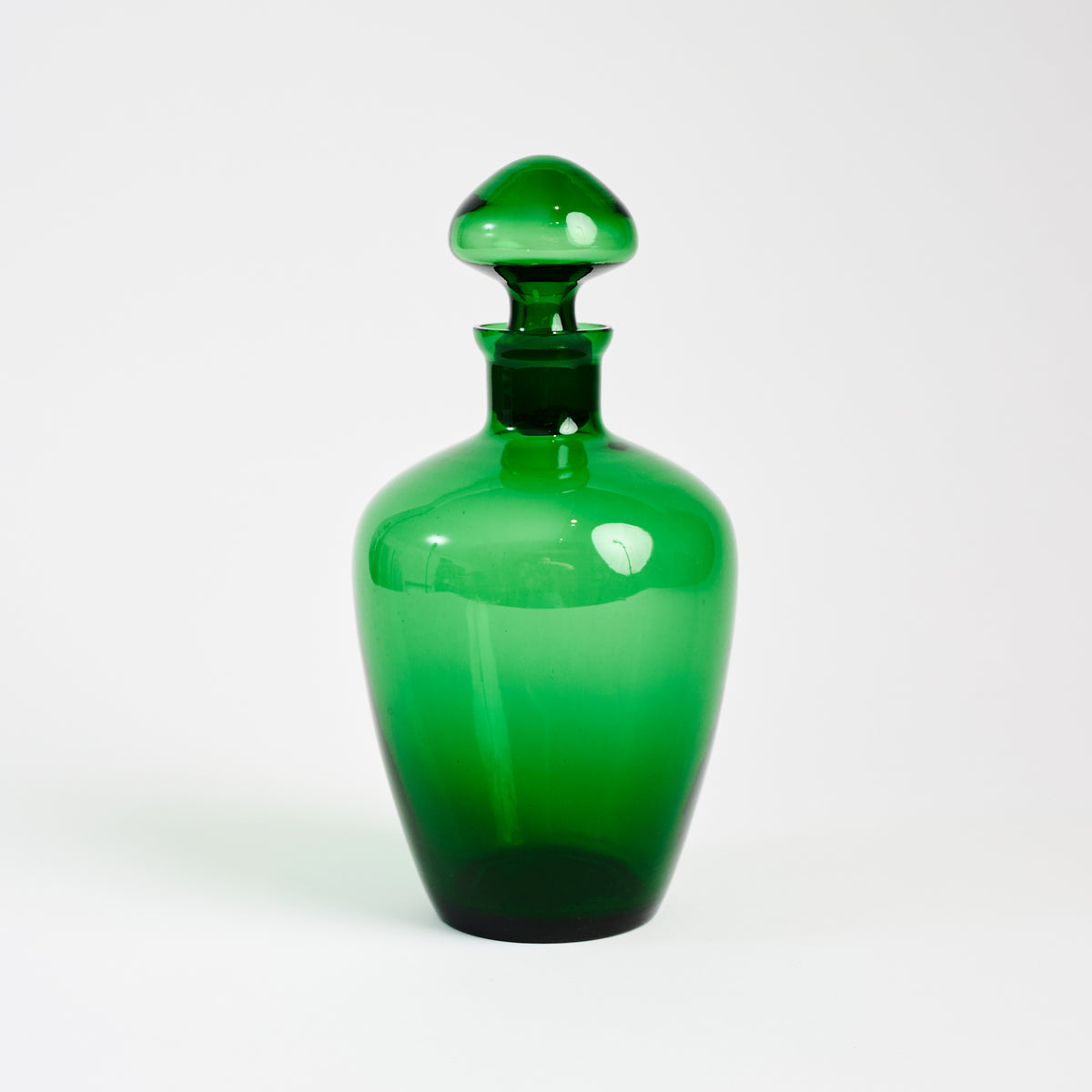 Vintage Green Glass Decanter on a white background at Addison West