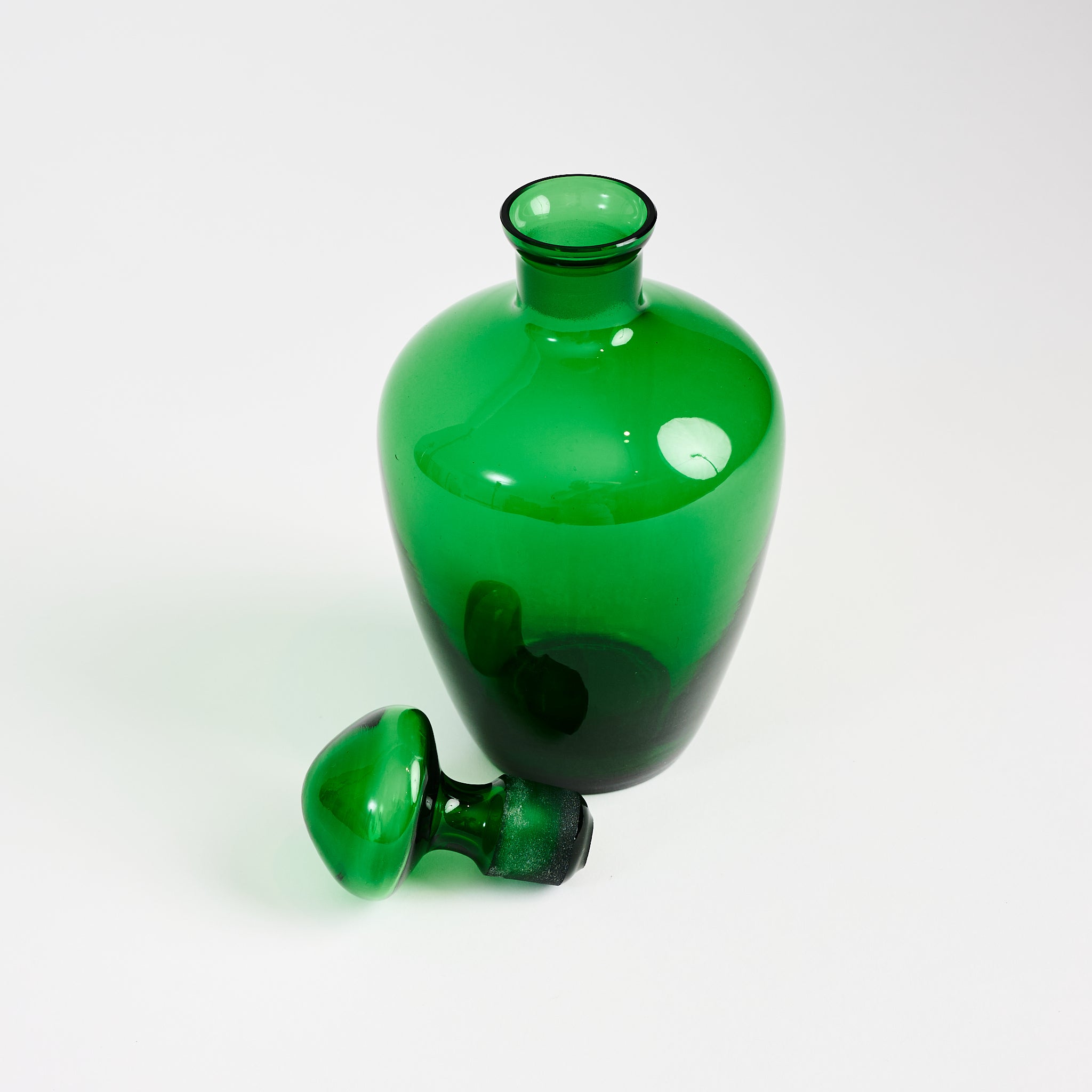 Vintage Green Glass Decanter on a white background at Addison West