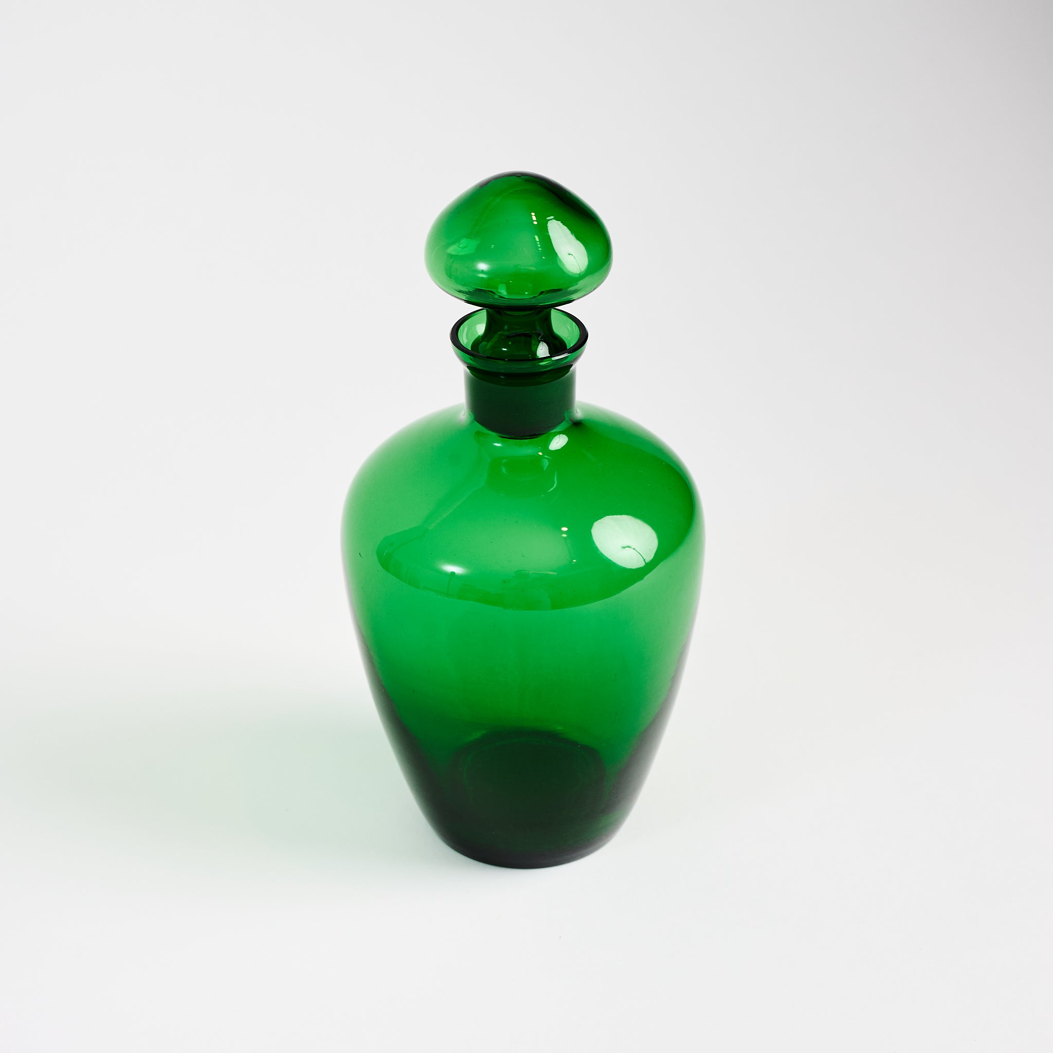 Vintage Green Glass Decanter on a white background at Addison West