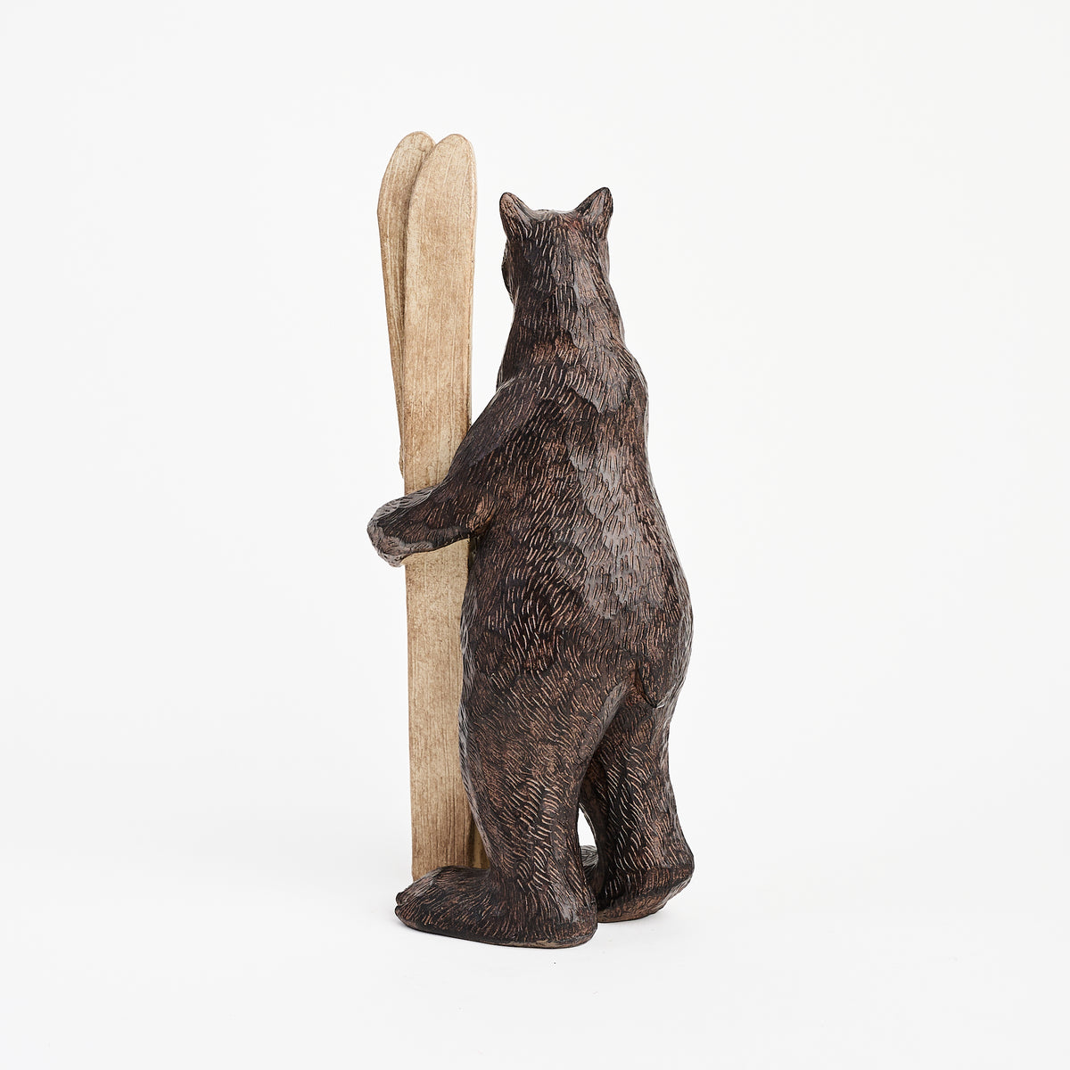 Bear and Skis on a white background at Addison West