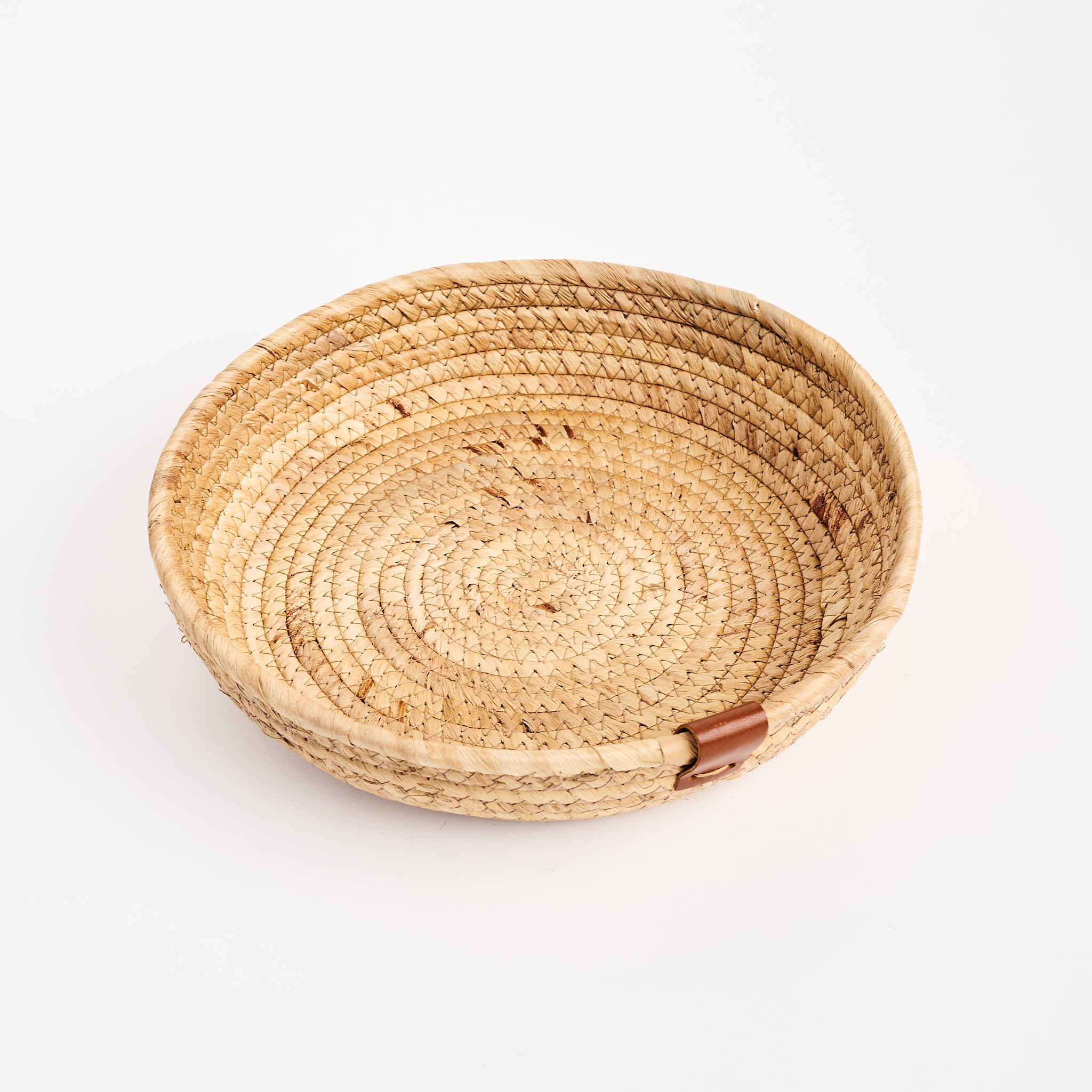 Seagrass & Hyacinth Woven Basket on a white background at Addison West