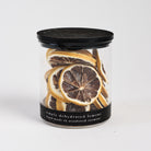 Slopeside Cocktails Dehydrated Lemons in Glass Jar on a white background at Addison West