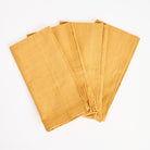 Mustard Homespun Napkins, Set of 4 on a white background at Addison West