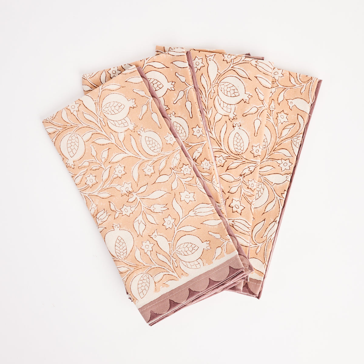 Pomegranate Clay Block Print Napkins, Set of 4 on a white background at Addison West