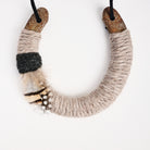 Upcycled Lucky Horseshoe in Beige Feather on a white background at Addison West