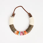 Upcycled Lucky Horseshoe in Rainbow on a white background at Addison West