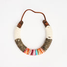 Upcycled Lucky Horseshoe in Rainbow on a white background at Addison West