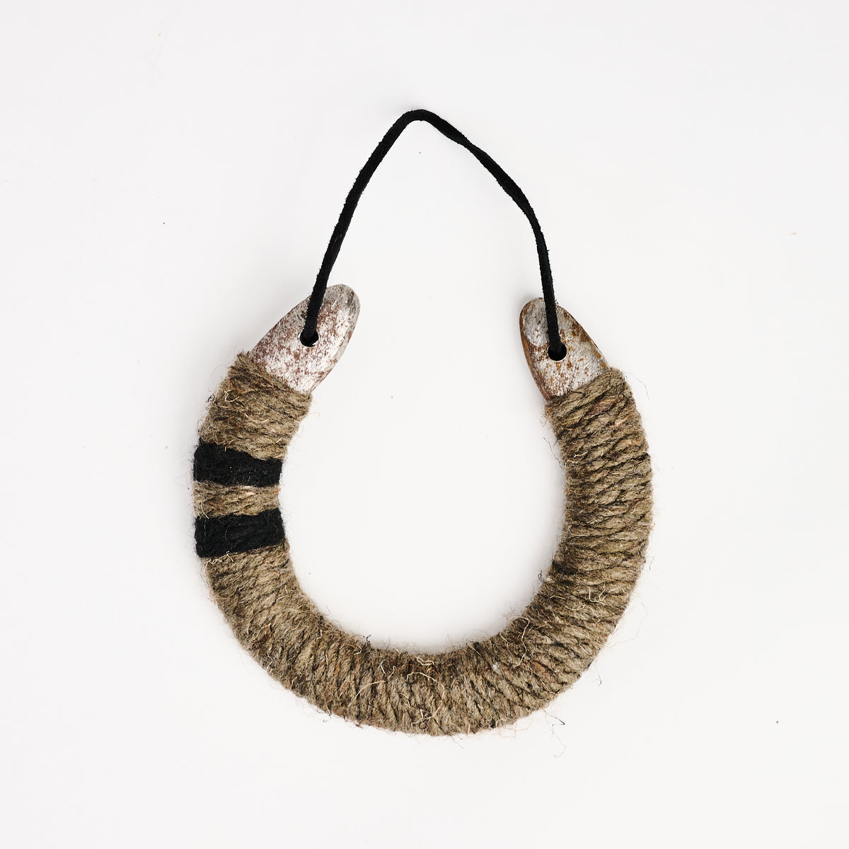 Upcycled Lucky Horseshoe in Neutral Stripes on a white background at Addison West