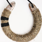 Upcycled Lucky Horseshoe in Neutral Stripes on a white background at Addison West