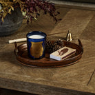 Trudon Reggio "Hint of Citrus from Calabria" Candle on a wood coffee table at Addison West