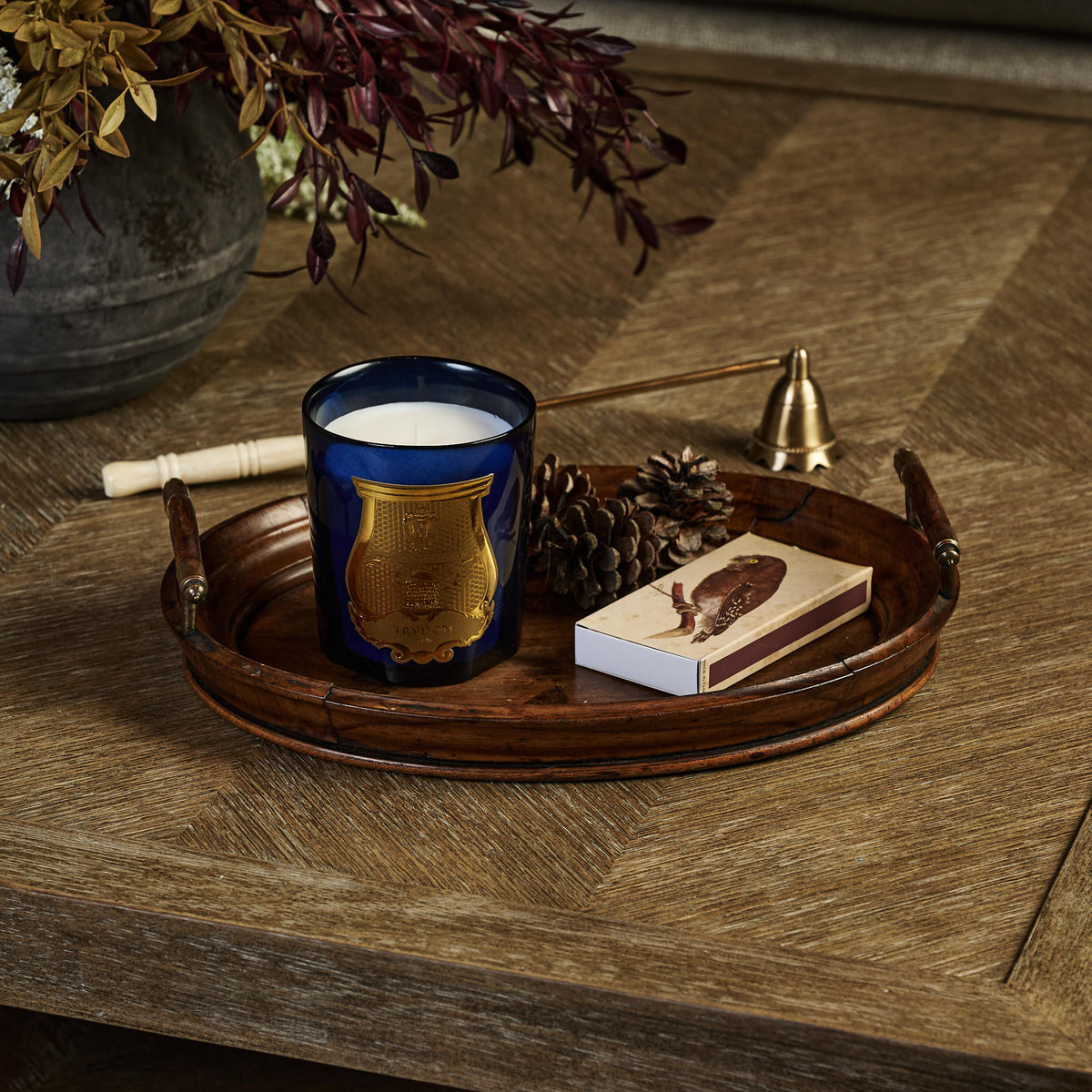 Trudon Reggio "Hint of Citrus from Calabria" Candle on a wood coffee table at Addison West