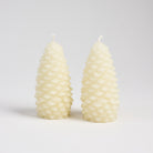 Pinecone Beeswax Candle in Cream on a white background at Addison West