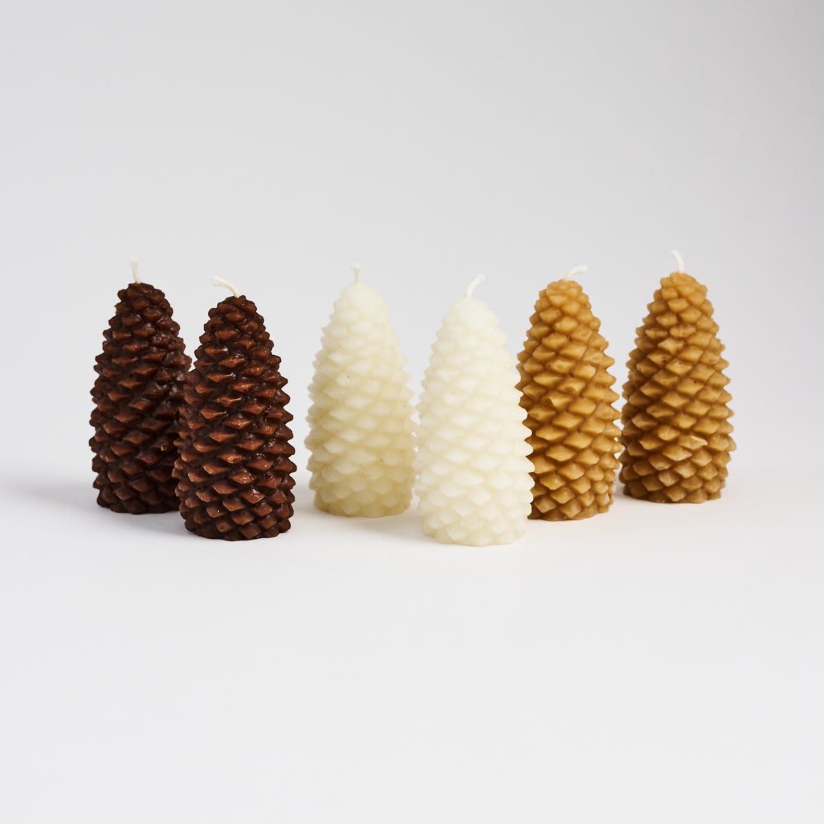 Pinecone Beeswax Candles on a white background at Addison West