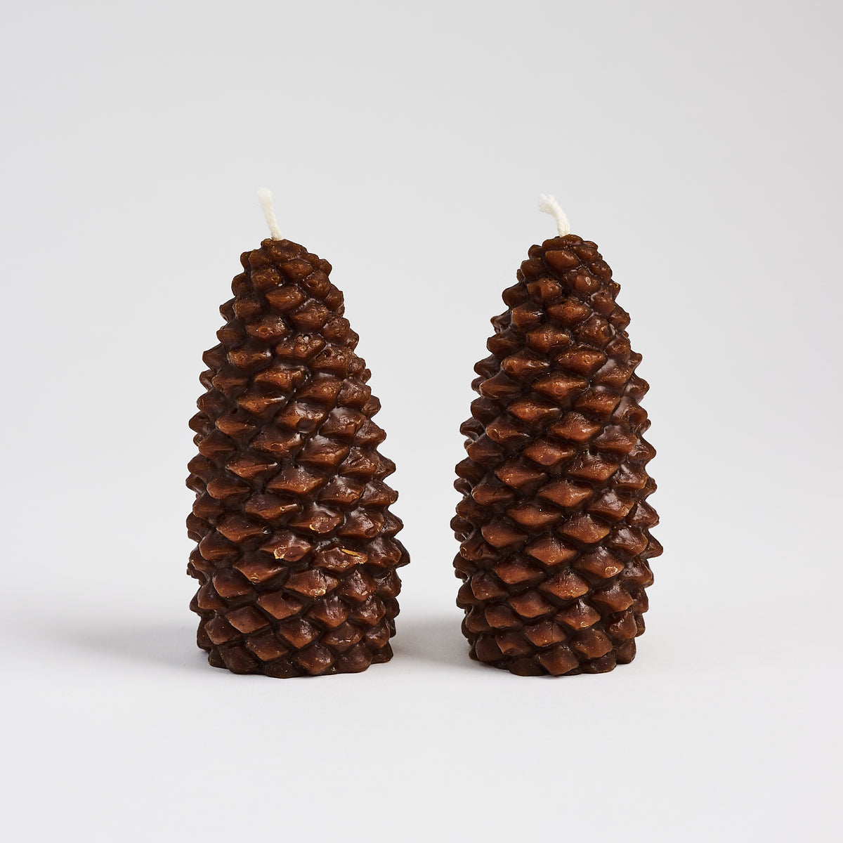 Pinecone Beeswax Candle in Espresso on a white background at Addison West