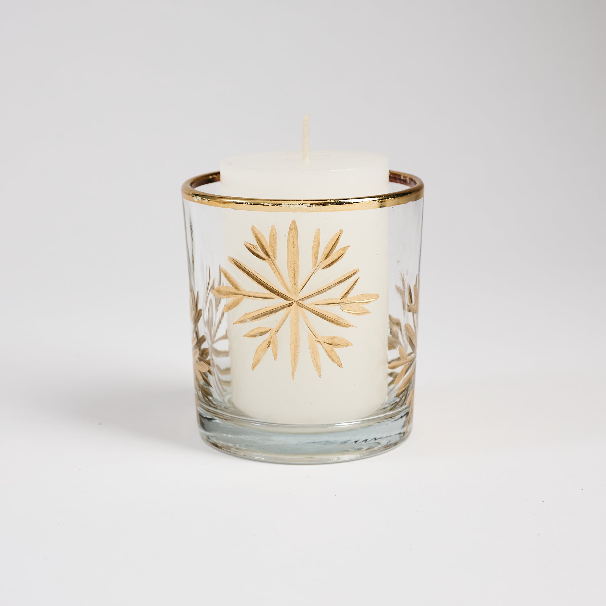 Snowflake Gold Etched Tealight Holder on a white background at Addison West