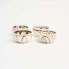 Stephanie Verdun Sauce Cup in Orange & Brown on a white background at Addison West