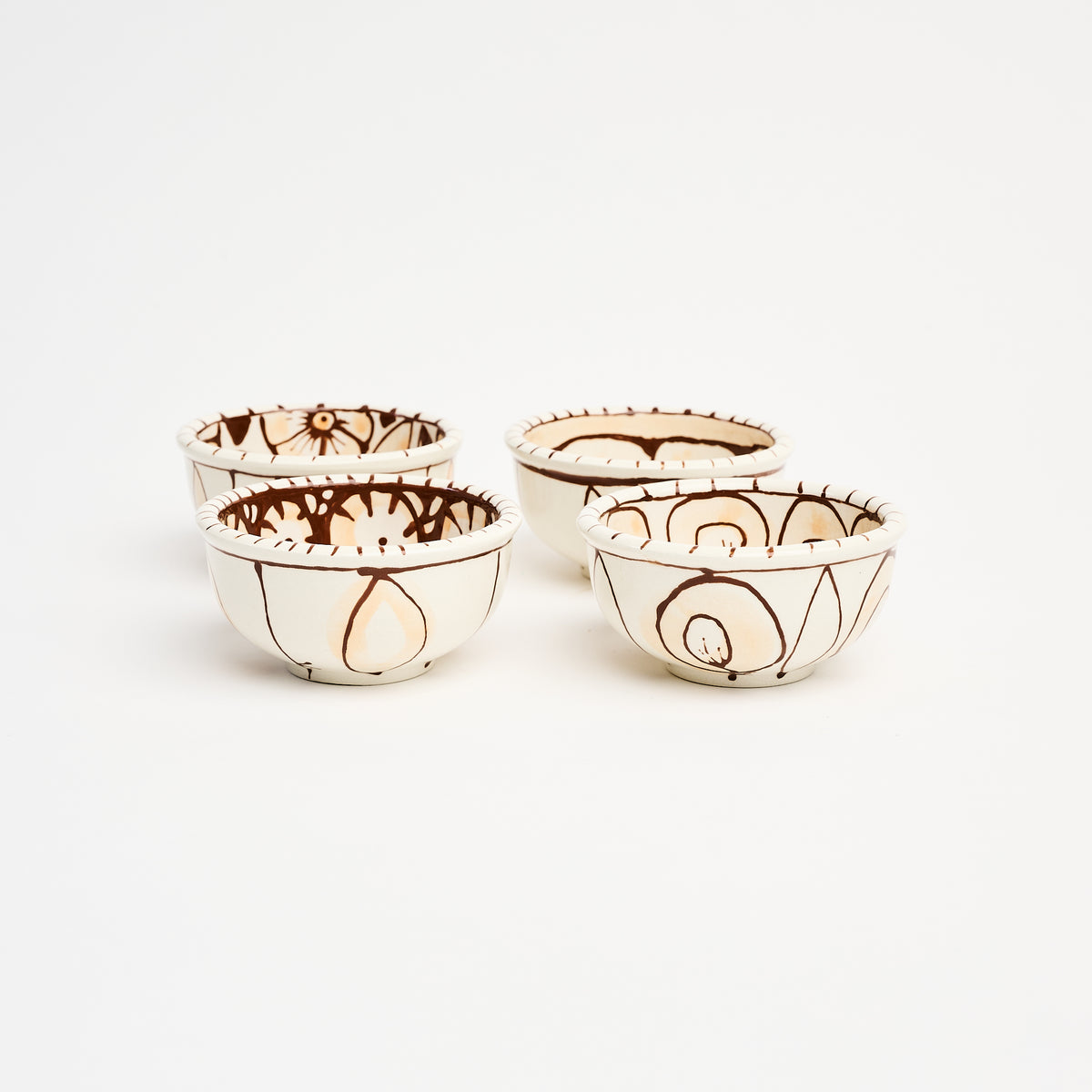 Stephanie Verdun Sauce Cup in Orange & Brown on a white background at Addison West