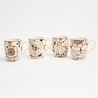 Stephanie Verdun Barrel Mug in Orange & Brown on a white background at Addison West