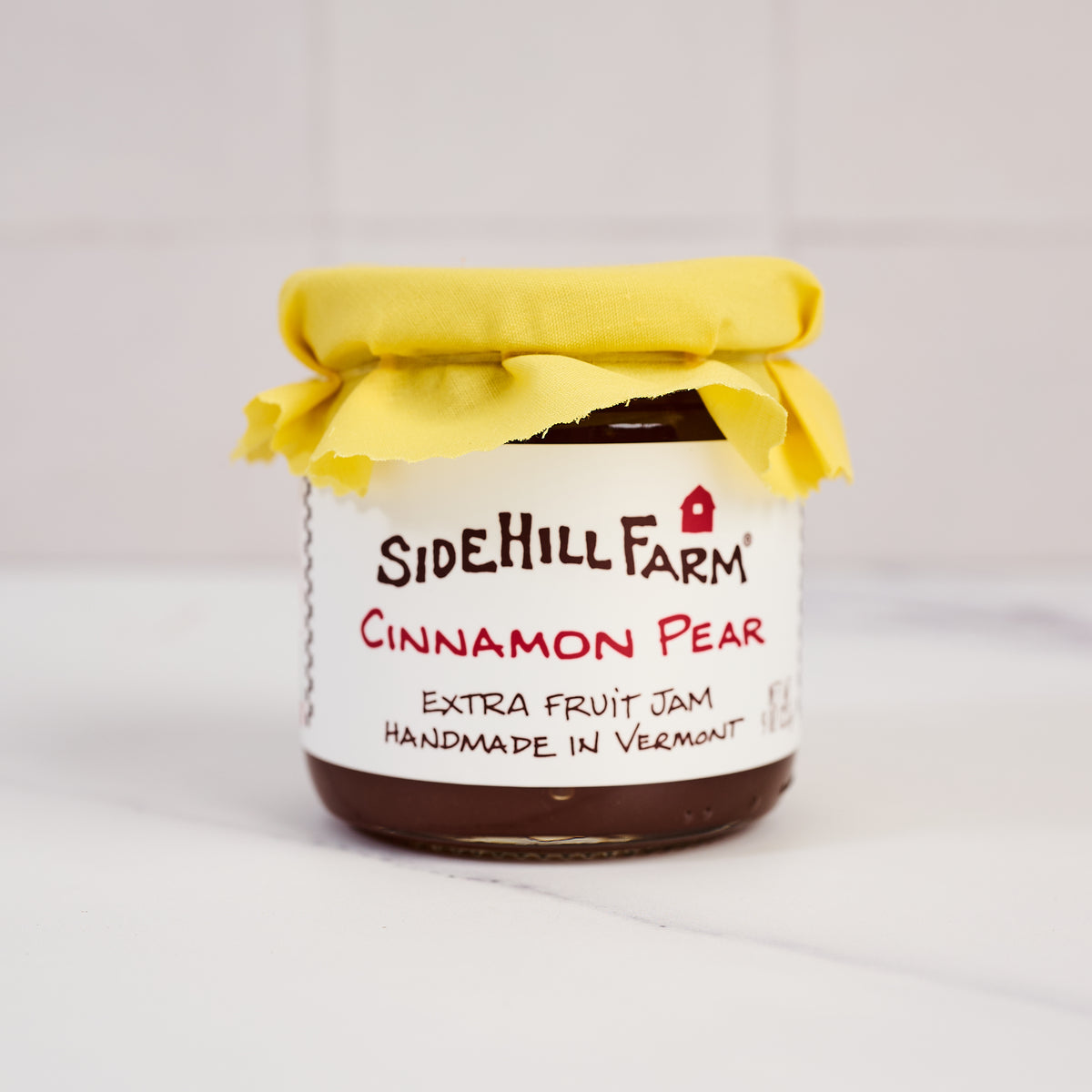 Sidehill Farm Cinnamon Pear Jam on a kitchen counter at Addison West