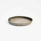 Crimped Steel Saucer on a white background at Addison West