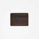 Leather Card Holder Wallet in Dark Brown on a white background at Addison West
