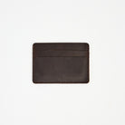 Leather Card Holder Wallet in Dark Brown on a white background at Addison West