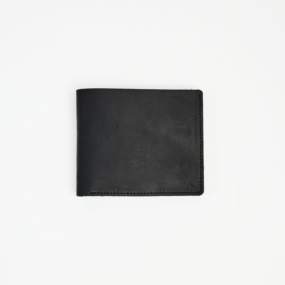 Leather Wallet Bifold Wallet in Black on a white background at Addison West