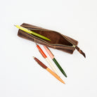 Leather Pencil Case in Dark Brown on a white background at Addison West