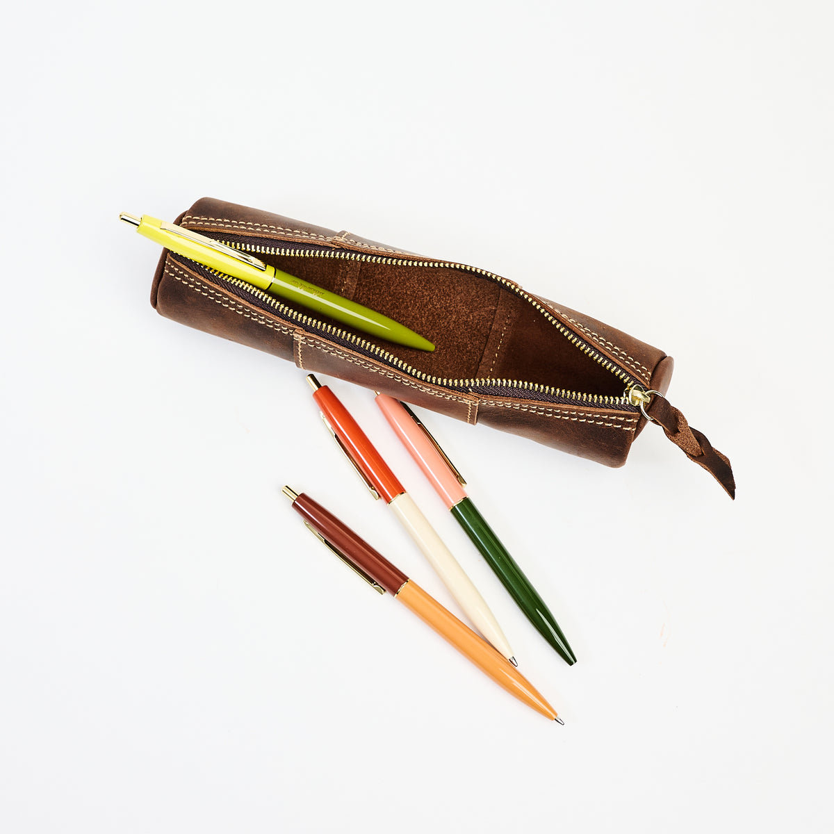 Leather Pencil Case in Dark Brown on a white background at Addison West