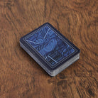 Ski the States Playing Cards on a wood table at Addison West