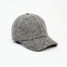 Wool Baseball Cap in Gray Herringbone on a white background at Addison West