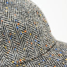 Wool Baseball Cap in Gray Herringbone on a white background at Addison West