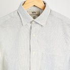 Warren Windsor Button Down in White Stripe on a white background at Addison West