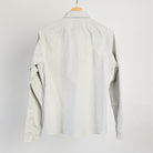 Warren Windsor Button Down in White Stripe on a white background at Addison West