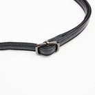Jasmin Muff Bag in Solid Black on a white background at Addison West
