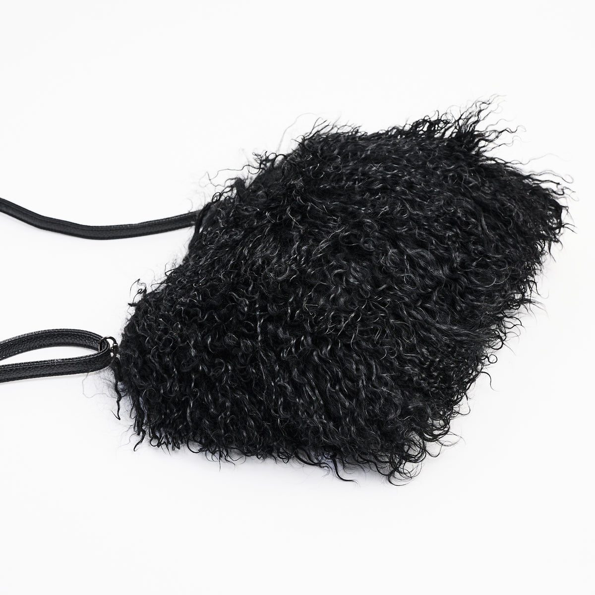 Jasmin Muff Bag in Solid Black on a white background at Addison West