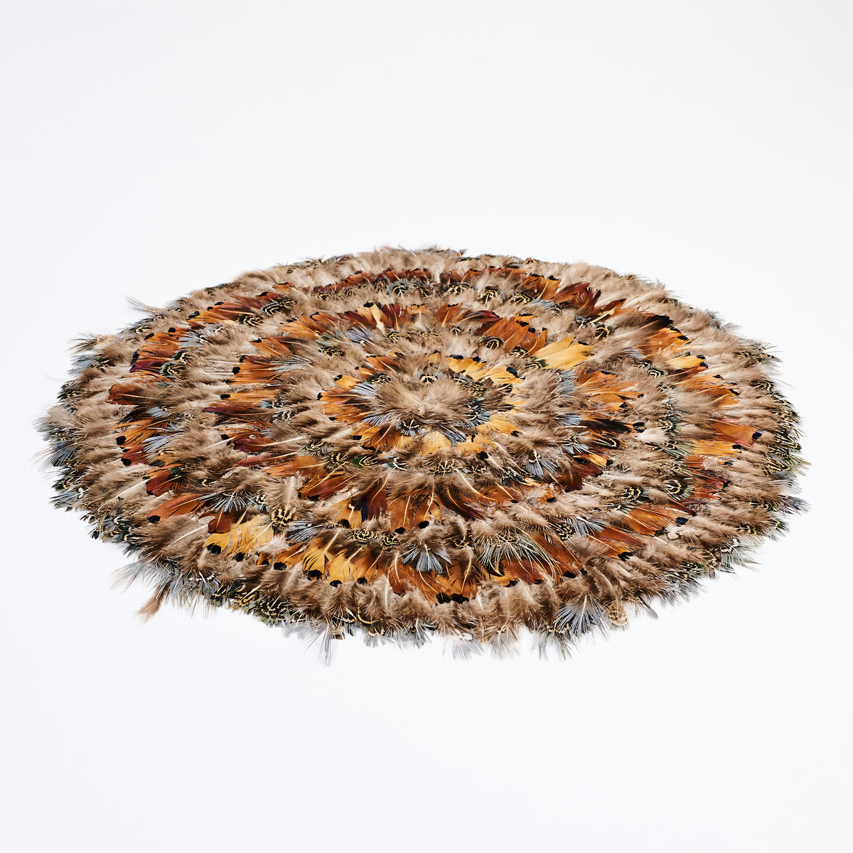 Pheasant Feather Placemat on a white background at Addison West