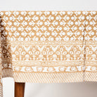 Charlotte Caramel Tablecloth on a white background at Addison West
