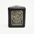Plymouth Cheese Truffle Cheddar on a white background at Addison West