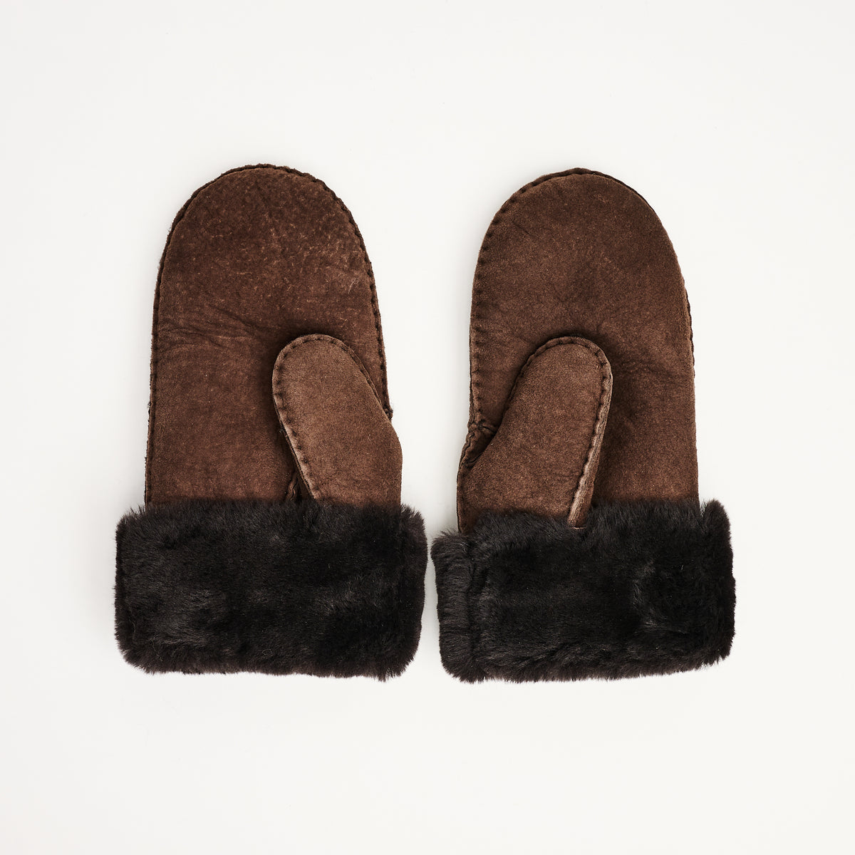 Medium Dark Brown Sheepskin Mittens on a white background at Addison West