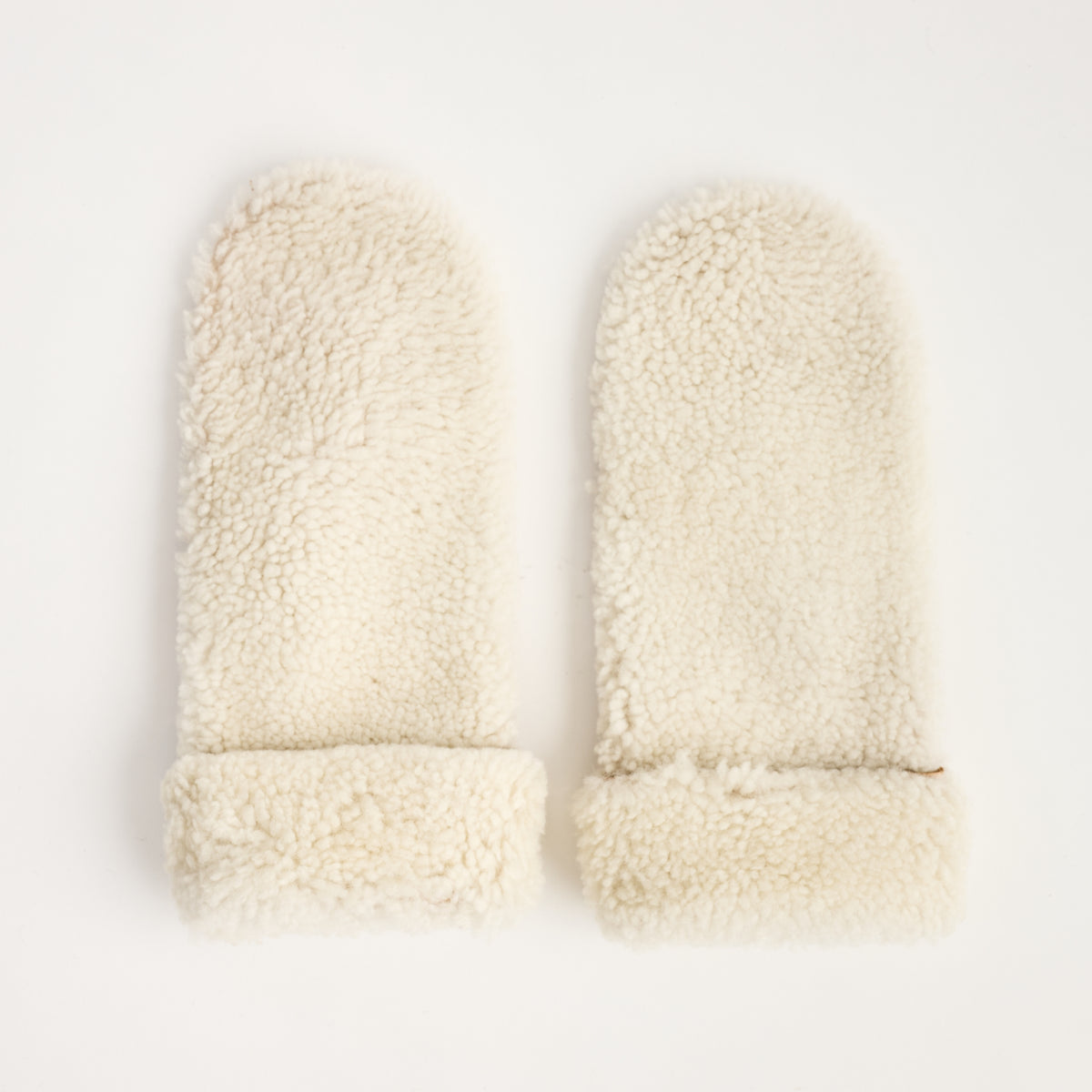 Iris Mittens in Tan and Ivory on a white background at Addison West