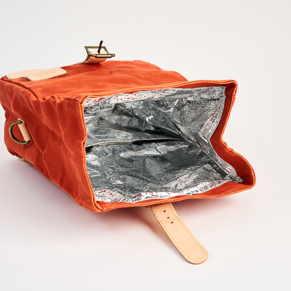 Insulated Field Bag in Hunter Orange on a white background at Addison West