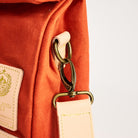 Insulated Field Bag in Hunter Orange on a white background at Addison West