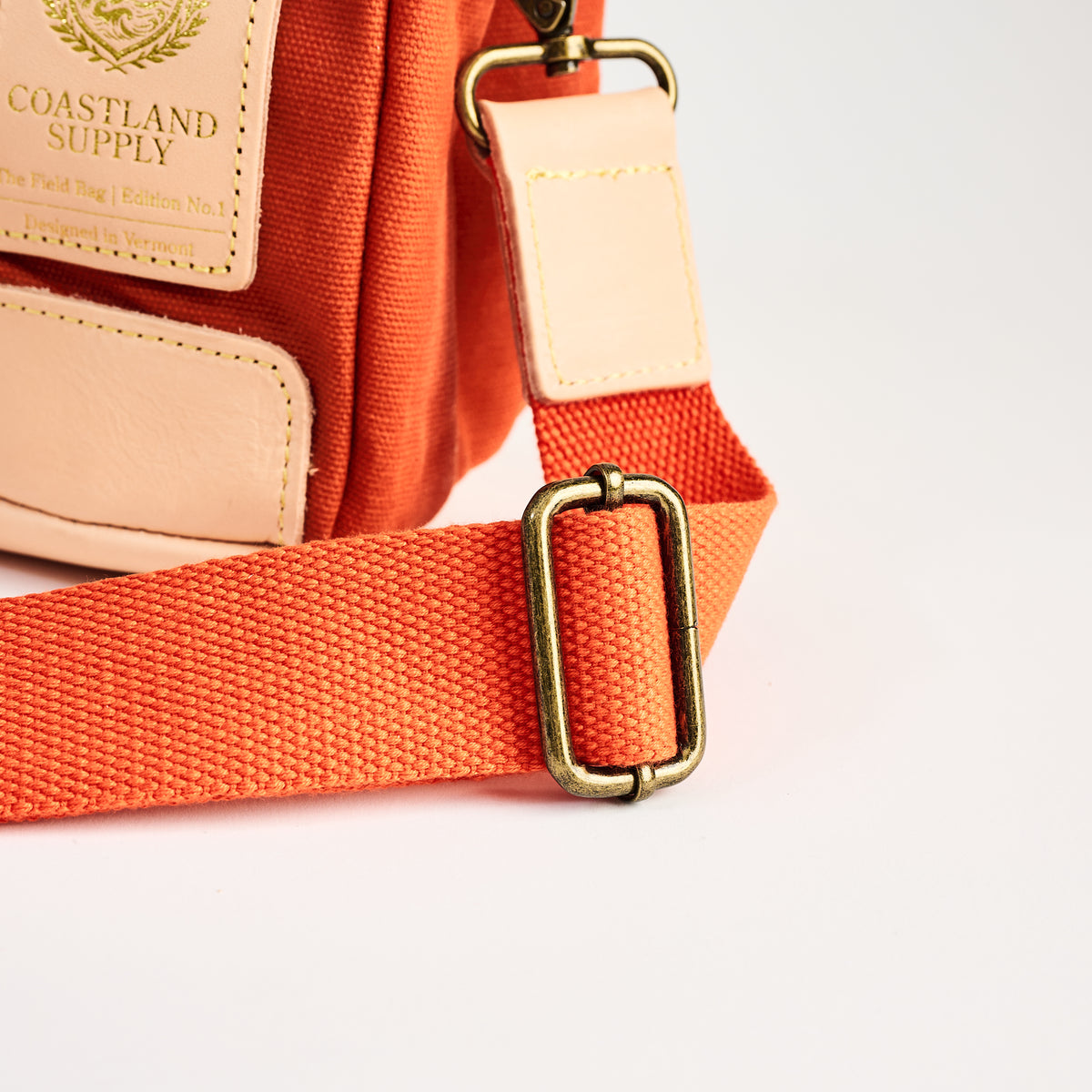 Insulated Field Bag in Hunter Orange on a white background at Addison West