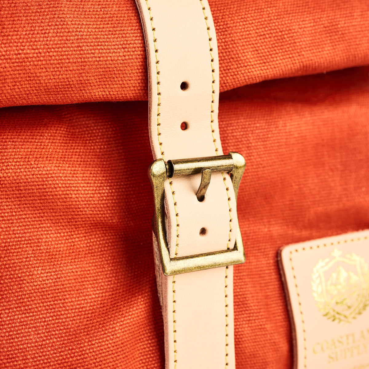 Insulated Field Bag in Hunter Orange on a white background at Addison West