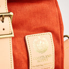 Insulated Field Bag in Hunter Orange on a white background at Addison West