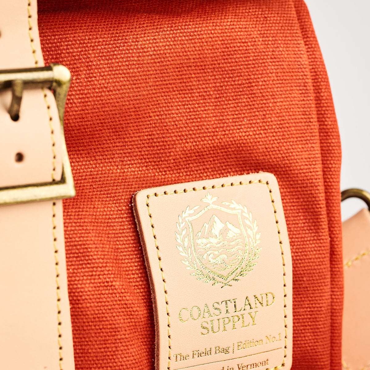 Insulated Field Bag in Hunter Orange on a white background at Addison West