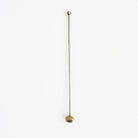 Holiday Bell Cocktail Stirrer on a white background at Addison West